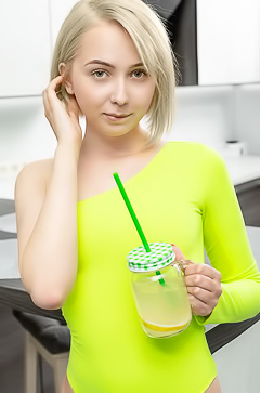 Bernie In Green Bodysuit That Hugs Her Sexy Ass Alluringly
