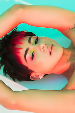 Mia Valentines Neon Lingerie Drapes Against Sleek Skin Under Strobe Lights