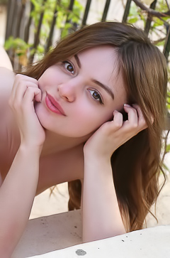 Klarissa Entices with wet hairy pussy shown